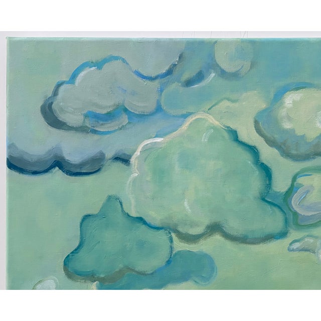 Abstract landscape of billowy clouds in celadons, blues, and greens. Nancy’s Bio: Nancy challenges her creativity by...