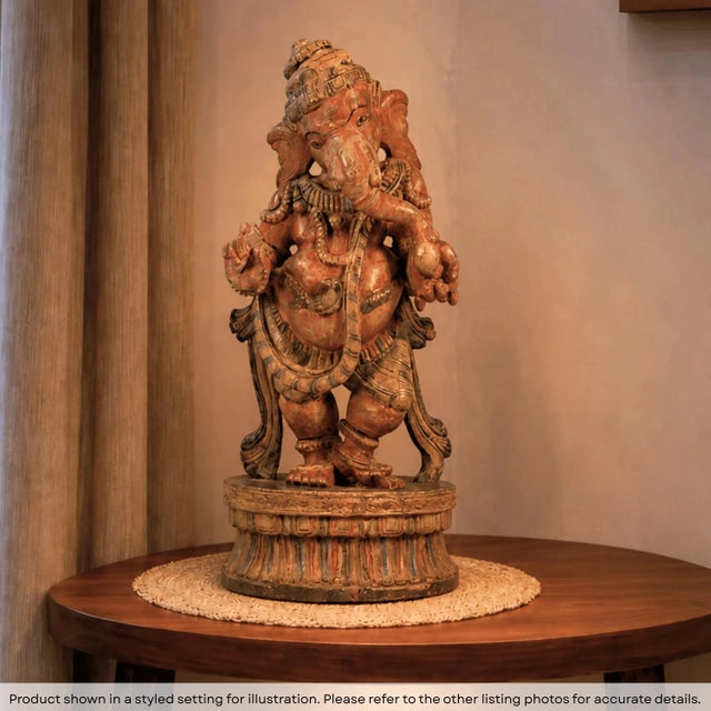 Invite the rhythmic grace of the divine into your sanctuary with this magnificent Dancing Ganesha. This is not merely a...