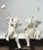 Good vintage condition. No damage, chips, or cracks. Trumpet is removable, inserts in and out. Height (Hanging Toe/Feet to...