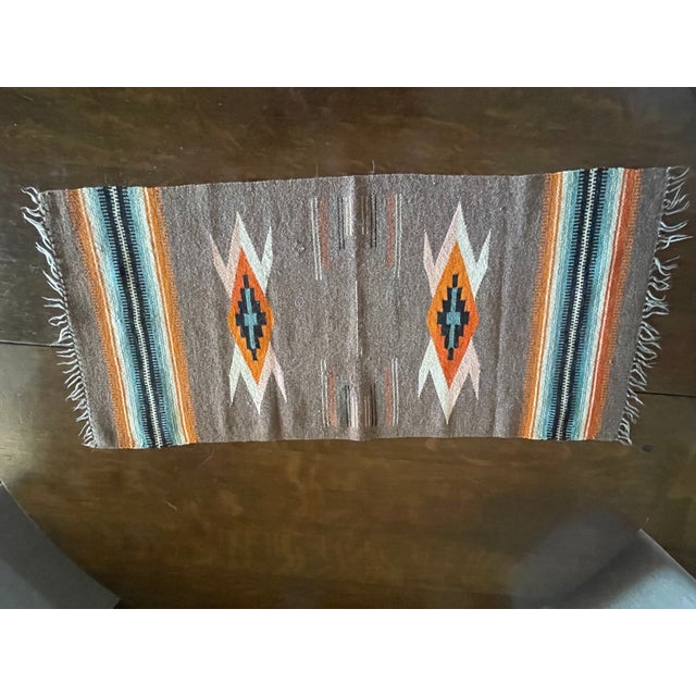 These are from my private collection of Chimayo rugs that I personally purchased about 30 years back in time. This beauty...