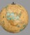 Cram's Imperial World Globe With Textured Mountain Ranges & Paw Footed Iron Base For Sale - Image 6 of 12