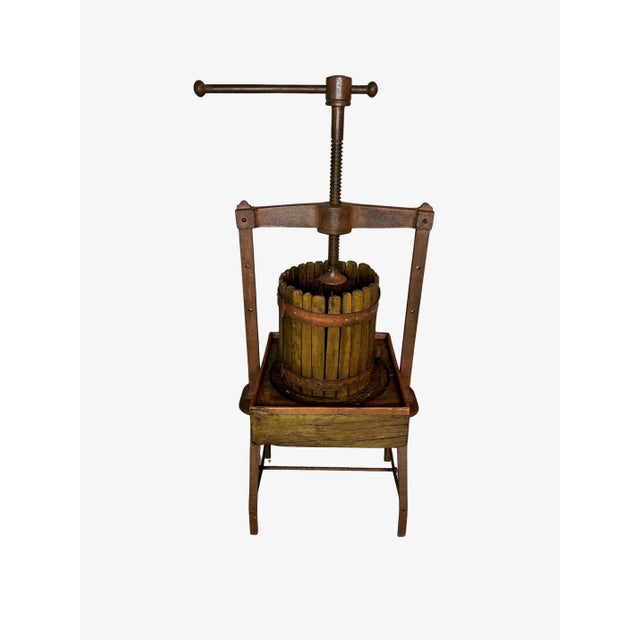 Authentic antique wooden cider and wine press featuring a beautifully aged patina and rustic handcrafted construction....