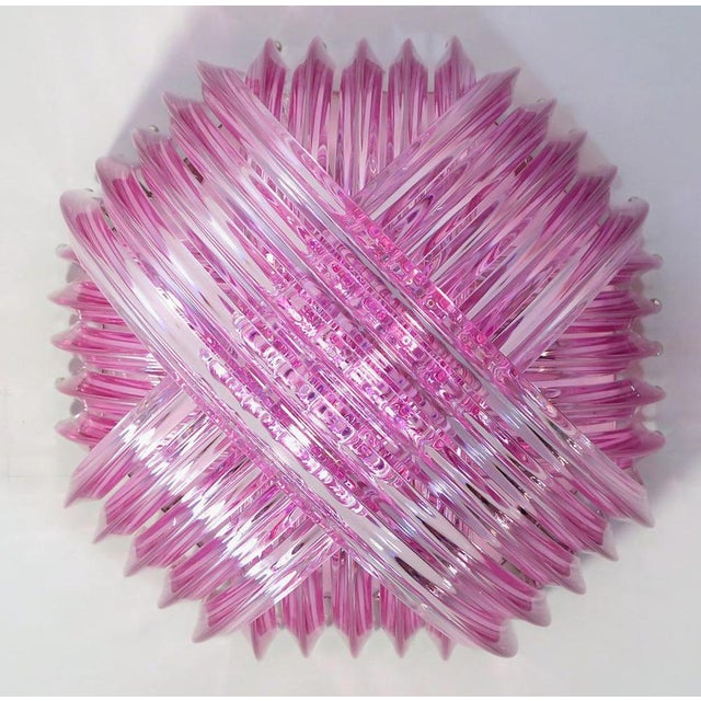 Pair Murano light pink glass chandeliers or ceiling light with four layers of curving “triedri” glass prisms on an...