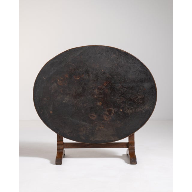 A traditional French wine tasting table designed with functionality and portability in mind. The tilt-top mechanism allows...