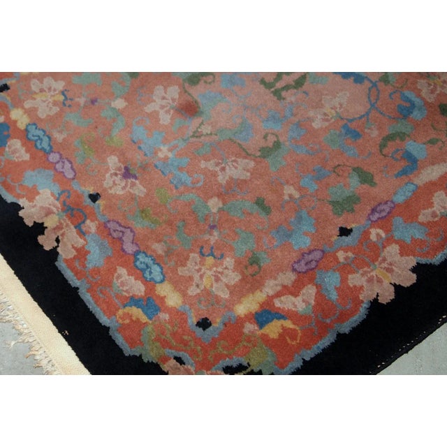 Antique Art Deco Chinese rug in unusual abstract design in peach, sky blue, purple and egg shell shades. The rug is in...
