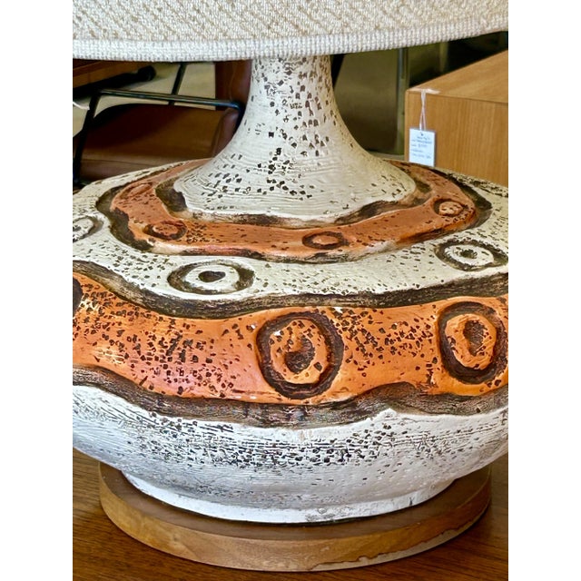 Beautiful, large MCM table lamp with orange and white base. Large original shade included.