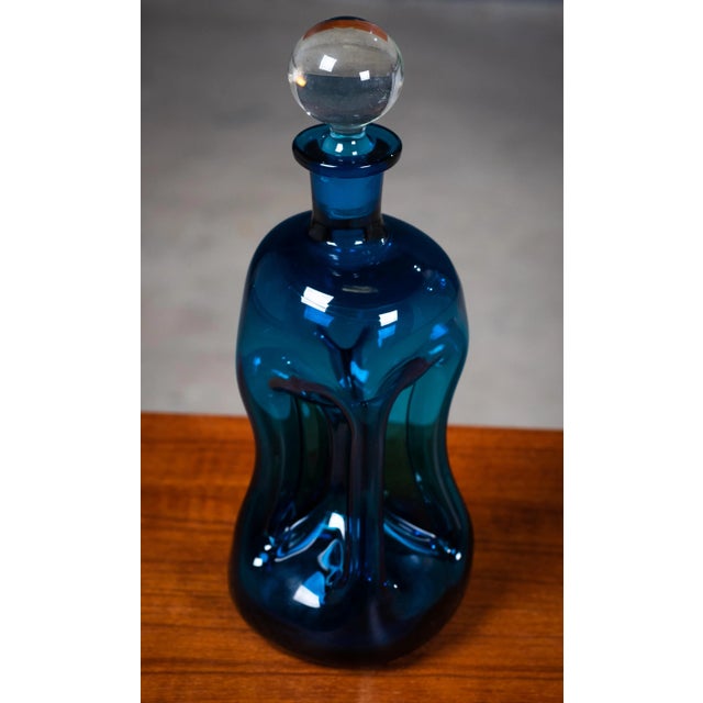 Midcentury danish glass 'kluk kluk' decanter designed by jacob e. Bang for holmegaard. A fine 1950s danish royal blue...