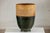 "About the Item This substantial artisan-made ceramic planter features a striking, tiered glaze that moves from matte...