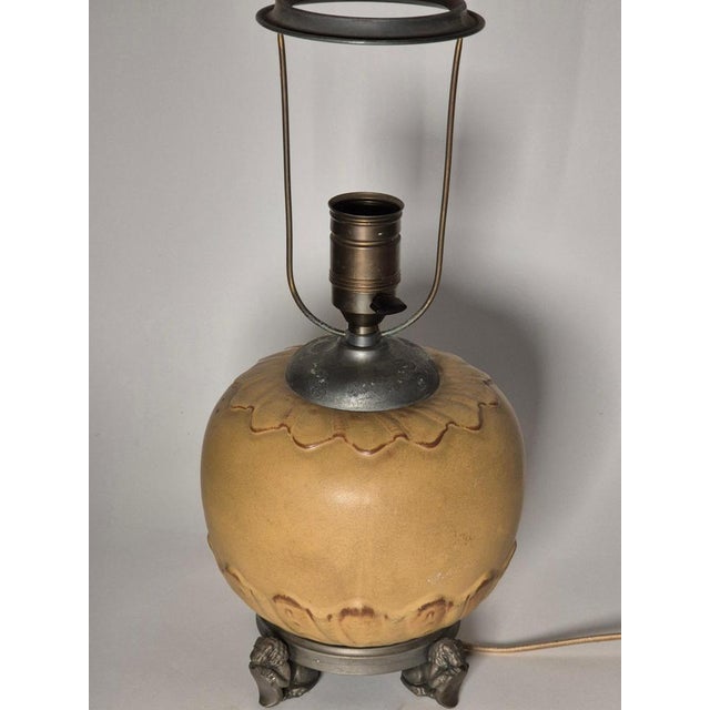 A rare table lamp in chinoiserie style from the 1920/30s by Svenska Metallverken, founded 1913 in Västerås, Sweden. A...