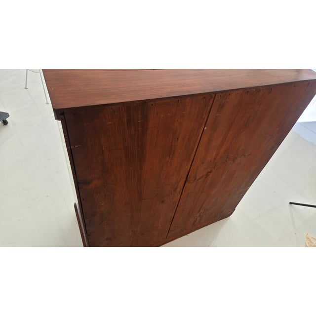 This piece is an Antique Victorian mahogany chest of drawers often called a Scotch Chest featuring large, deep-drawered...