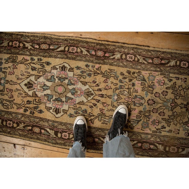 :: Center medallion in shield-like release with asymmetric weight atop a covered field of floral bouquets and blossoms....