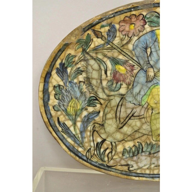Early 20th Century Antique Persian Iznik Qajar Style Ceramic Pottery Blue Oval Horse Rider Tile C3 For Sale - Image 5 of 10
