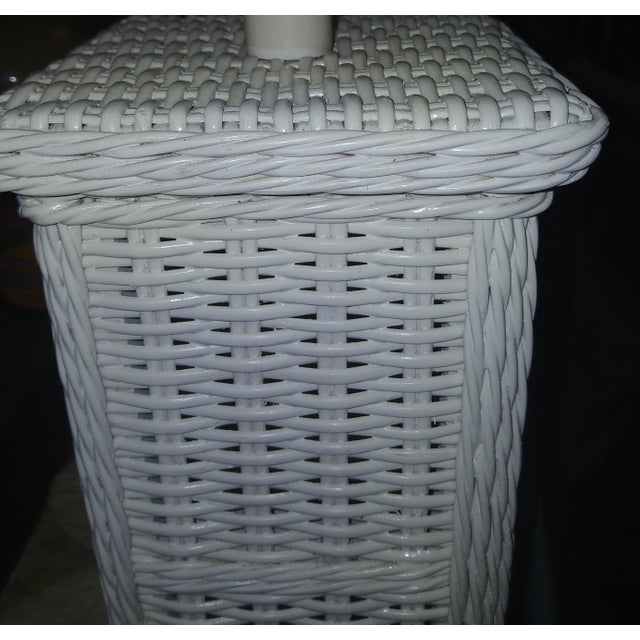 Gorgeous 1970s woven wicker Rattan lamp with scalloped edges, braided accents, and large wicker shade. In wonderful...
