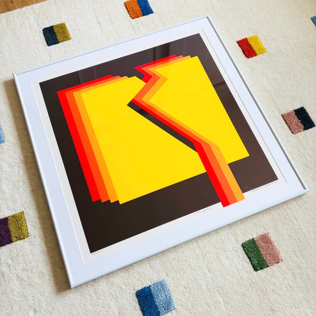 A 1970s vintage geometric serigraph by artist Frank Rowland. Pencil signed on the bottom, titled "Fanfare" and numbered...