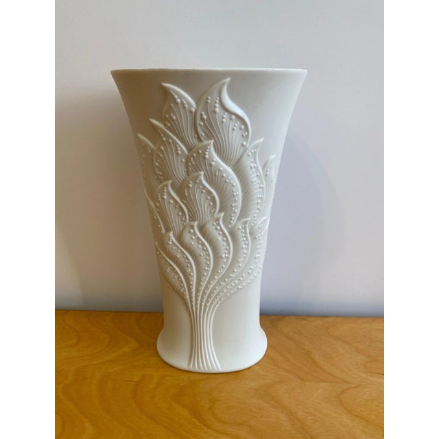 Kaiser West German Porcelain vase with a leaf design to front and back. Nice size at 10" tall.