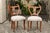 A set of four Austrian Biedermeier dining chairs from the mid-19th century, with lyre-shaped backs, carved urns and new...