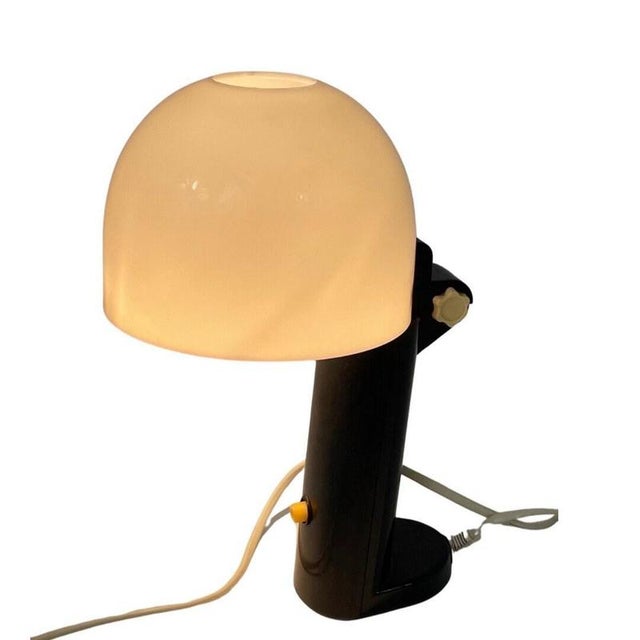 Fuder f-666-2 space age design table lamp or mushroom table lamp. The shade can be adjusted by lifting it and creating a...
