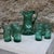 Vintage orangeade service in emerald green blown glass. retro charm. consisting of a pitcher and six matching glasses,...