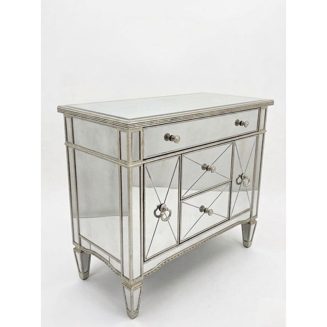 This elegant pair of vintage mirrored cabinets exudes a sophisticated, Hollywood Regency-inspired aesthetic. Featuring a...
