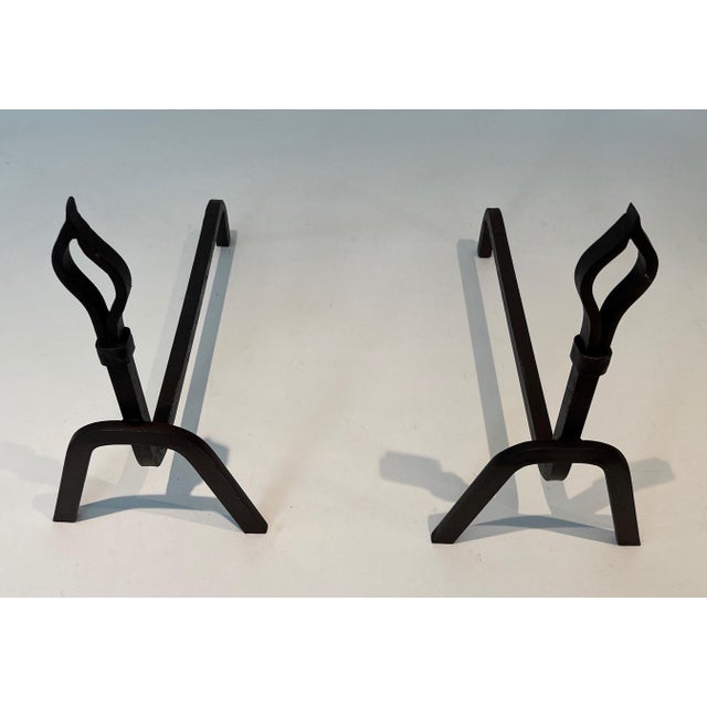 This very beautiful and unusual pair of modernist andirons is made of wrought iron. This is a beautiful artwork with...