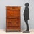 Mahogany and crotchet secretary. Drawer in the lower section, central drop-down door with burgundy leather insert inside,...