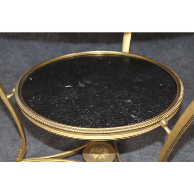 This exceptional pair of Louis XV style bronze guéridons, dating to the 1980s, beautifully captures the elegance and...