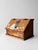 This vintage hand-painted wood bread box features a sloped lid, warm wood tone, and a Holly Hobbie style folk scene that...