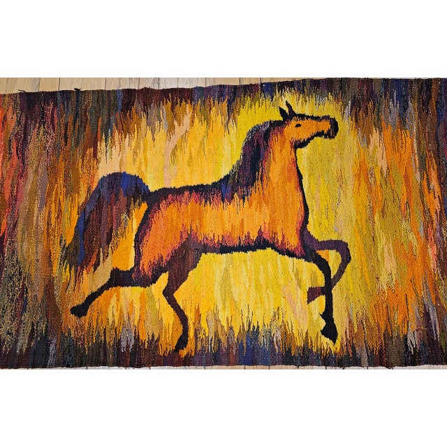 This stunning mid-century hand-woven tapestry captures the dynamic energy of a galloping horse in a composition of...