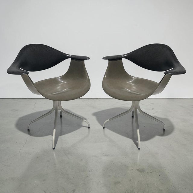 Vintage George Nelson for Herman Miller DAF parchment swaged leg chairs. This stunning pair of mid century modern sculpted...
