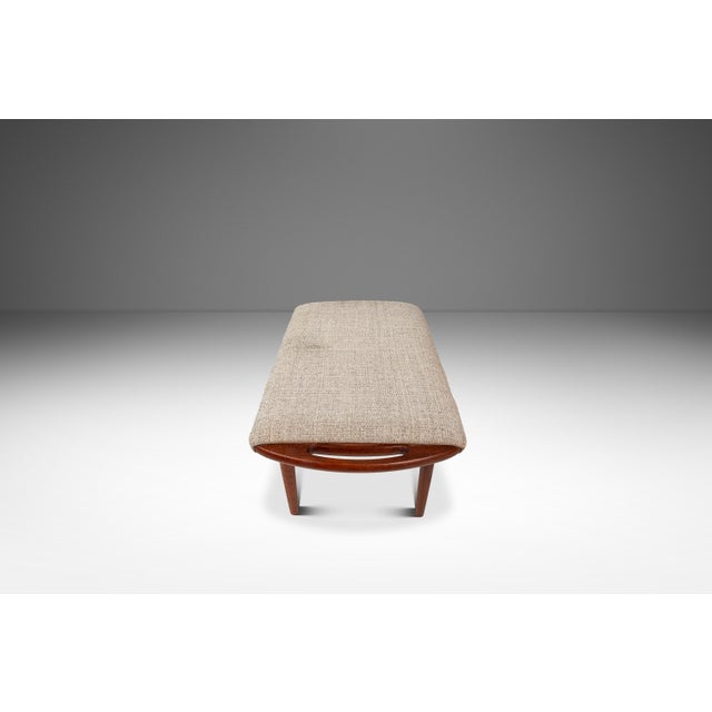 Introducing a splendid footstool designed in the manner of Hans Wegner's "Papa Bear" chair ottoman. Constructed from solid...