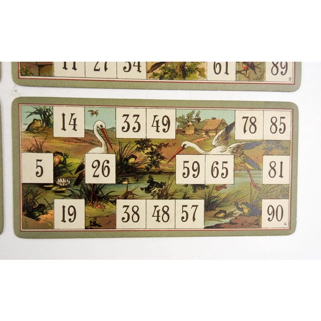 Circa 1890's lithographed lotto game cards. This group of 4 has storks, wolves, sheep, goats,birds, cats and squirrels. No...