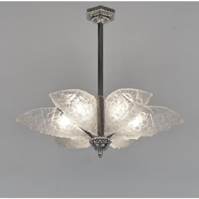 Francis Hubens A stunning French 1925-1935 art deco chandelier in nickel plated solid brass or bronze by the famous Paris...