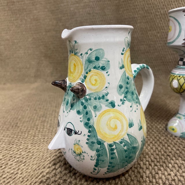 Beautiful 1970-1980s Bjorn Wiinblad pottery set. Each piece features imaginative round faced figures and floral designs...