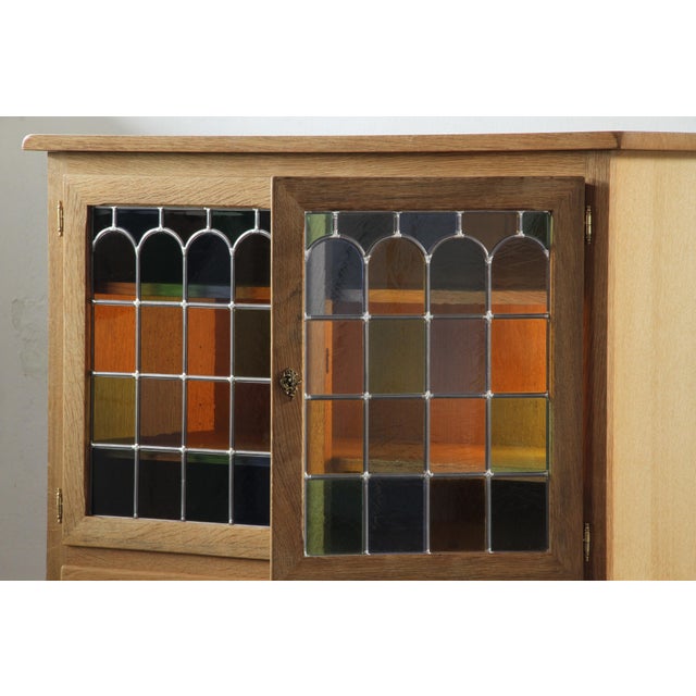 A Danish cabinet made from Nordic oak in the style of Mid-century Modern. Manufactured in Denmark 1994, see picture of...