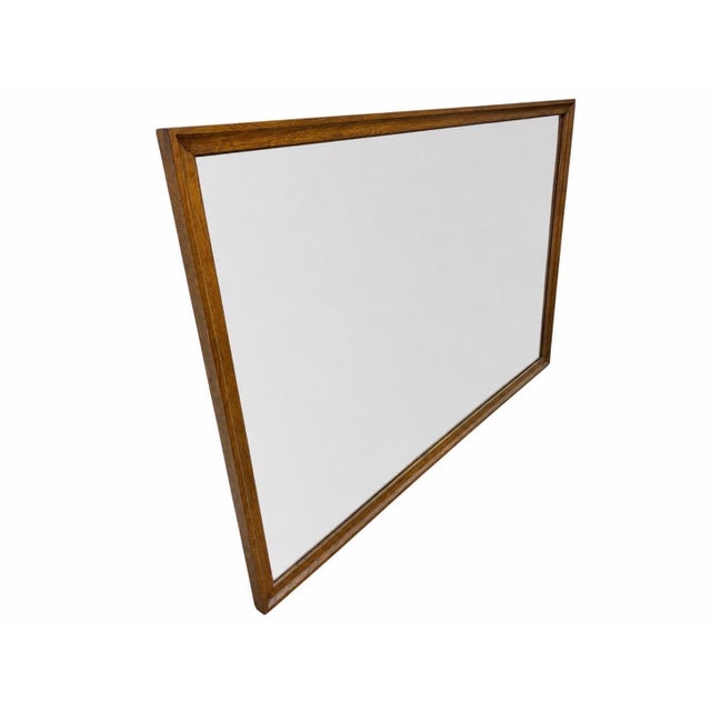 Complete your mid-century interior with this authentic Broyhill walnut wall mirror, showcasing the clean lines and...