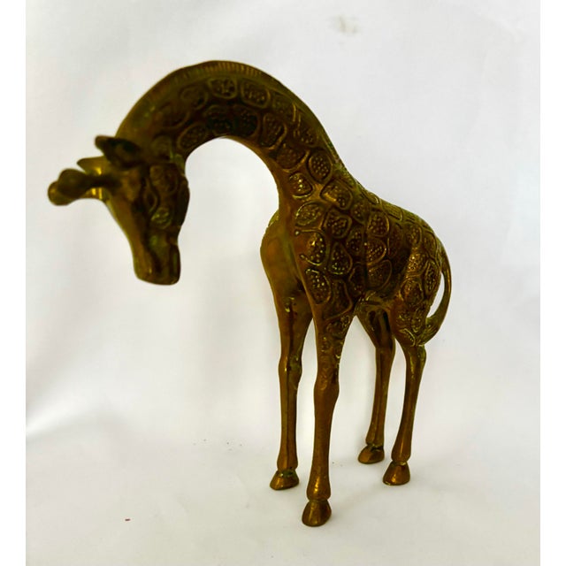 A charming vintage brass giraffe sculpture by Leonard Silver Manufacturing Group, circa 1970s. This wonderfully stylized...