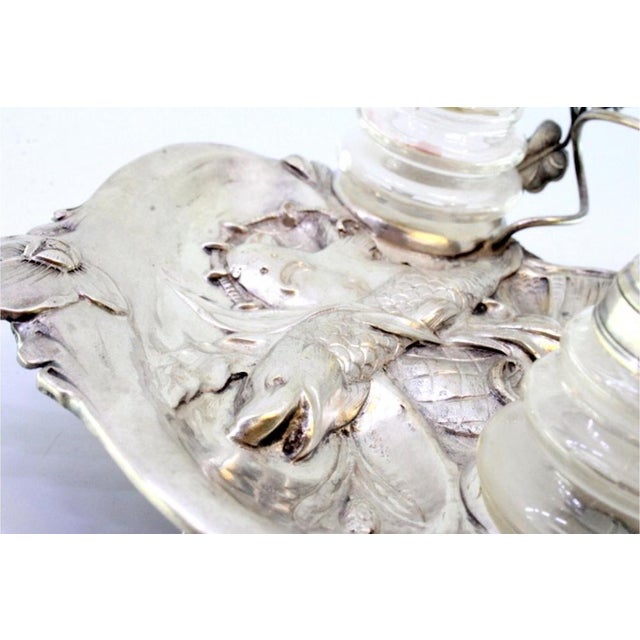 Silver and Glass Inkwell with Embossed Fish Figure and Acanthus Leaves, in Very Good conditions. Designed 1890 to 1919...