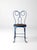 This vintage ice cream parlor chair dates to the early 20th century and features a classic spectacle-back design formed in...