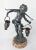 We are selling this small silvered figure. This bronze looking figure appears to be a hollow-cast white metal with...