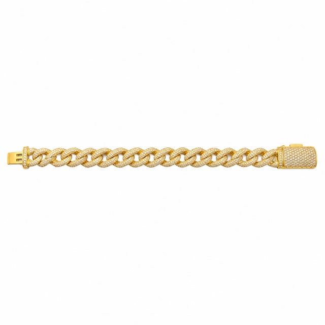 Sculptural and diamond-forward, this 14K Yellow Gold infinity bracelet combines round natural diamonds with a bold...