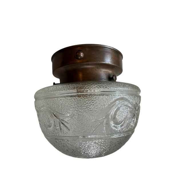 A charming light fixture perfect for a smaller ceiling that needs great light. Original brass holder has a great patina....