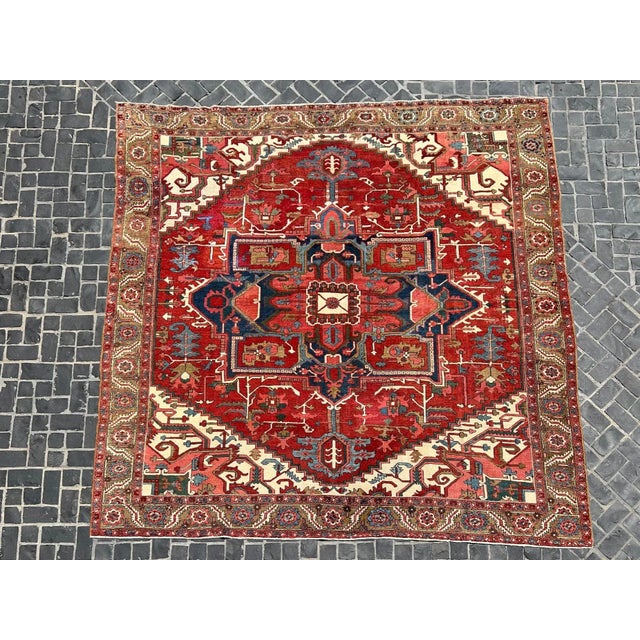 Circa late 19th century fine antique Heriz carpet . Very unusual square size . Vivid natural dyes in madder red and rich...