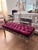 An elegant antique carved giltwood bench featuring an ornate scrolling foliate frame and gracefully curved cabriole legs,...