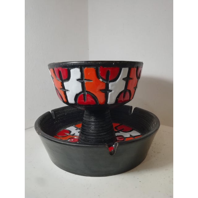 Colorful ceramic set by Bitossi. A beautiful piece inspired by Capogrossi's informal art with the forms of Ettore...