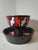 Colorful ceramic set by Bitossi. A beautiful piece inspired by Capogrossi's informal art with the forms of Ettore...