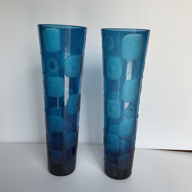 A striking matched pair of vintage Blue Odyssey collection art glass vases produced by Fenton International (circa 2008)....
