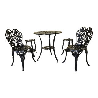 1950s Rose-Pattern Cast Iron and Aluminum Garden Bistro Set With Two Plant Stands, 5 Pieces For Sale
