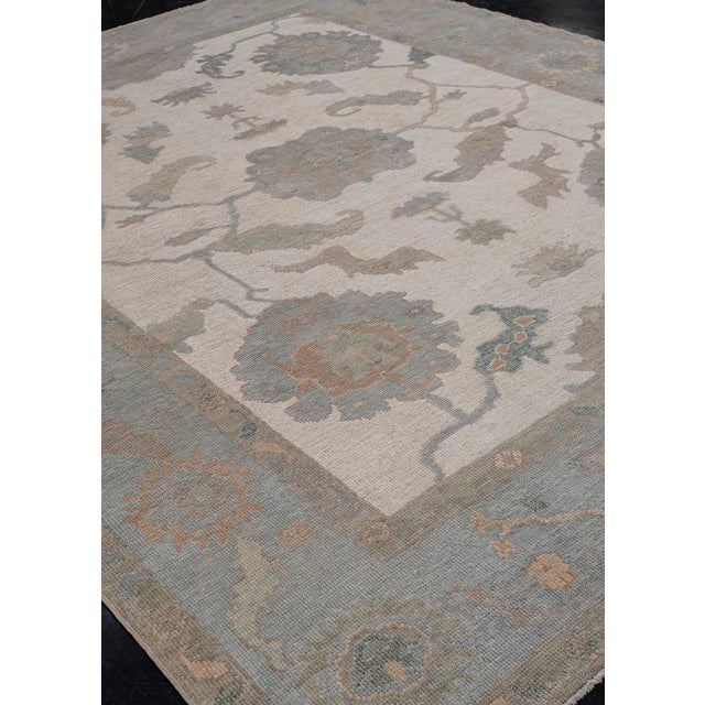 Turkish Oushak Rug Blue & Taupe Handwoven Wool Rug 7'11" X 9'11" This 7'11" x 9'11" Turkish Oushak rug displays an elegant...