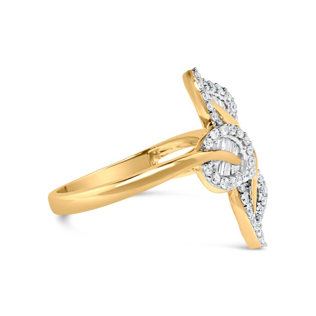 Embrace nature's splendor with our 18K Yellow Gold Plated Triple Leaf Ring, a botanical masterpiece in .925 sterling...