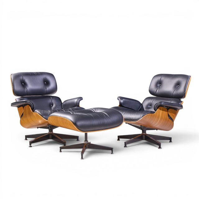 Charles and Ray Eames for Herman Miller Mid Century Eames Walnut Lounge Chairs - Pair with Ottoman Each chair measures:...